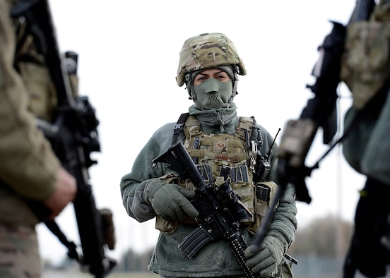Staff Sgt. Vanesa Rose, 5th Security Forces Squadron member, stands guard at Minot Air Force Base, North Dakota Oct. 28, 2016, in support of exercise Global Thunder 17.  Global Thunder is an annual training event that assesses command and control functionality in all U.S. Strategic Command mission areas and affords component commands a venue to evaluate their joint operational readiness. (U.S. Air Force photo by Tech. Sgt. Evelyn Chavez)
