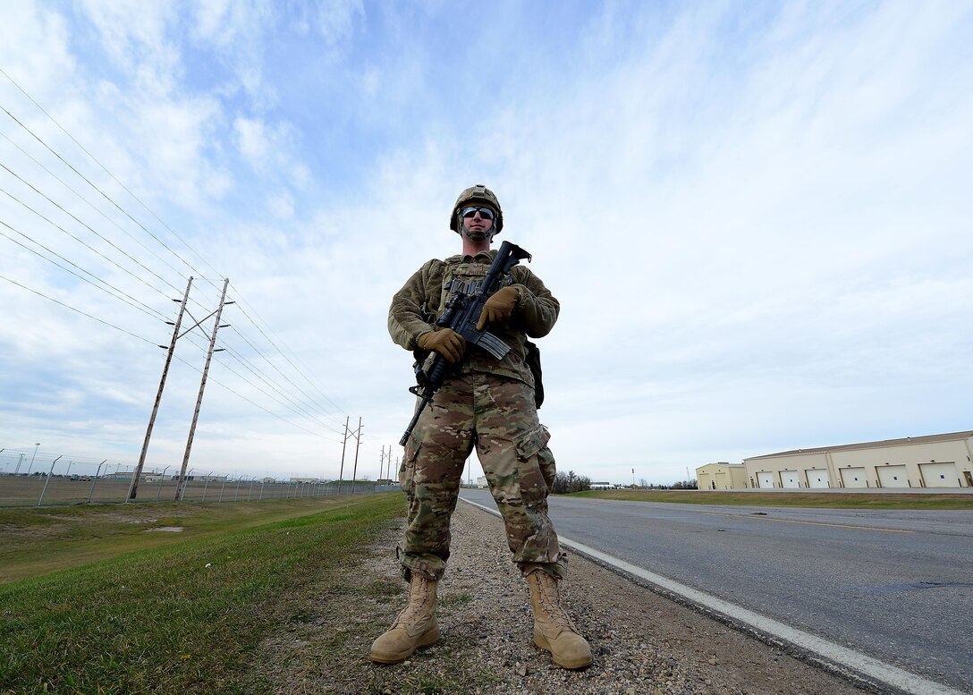 Staff Sgt. Timothy Driver, 5th Security Forces Squadron member, stands guard at Minot Air Force Base, North Dakota Oct. 28, 2016, in support of exercise Global Thunder 17.  Global Thunder is an annual training event that assesses command and control functionality in all U.S. Strategic Command mission areas and affords component commands a venue to evaluate their joint operational readiness. (U.S. Air Force photo by Tech. Sgt. Evelyn Chavez)

