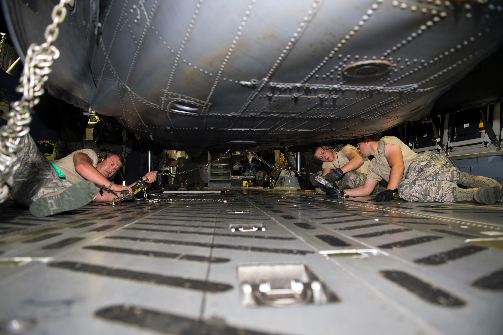 Members of the 41st Helicopter Maintenance Unit secure an HH-60G Pave Hawk on a Boeing C-17 Globemaster III, during an exercise, Nov. 1, 2016, at Moody Air Force Base, Ga. Approximately 100 Airmen from all combat rescue specialties in the 347th Rescue Group will participate in an exercise slated to take place at Tyndall AFB, Fla. (U.S. Air Force photo by Airman 1st Class Greg Nash)