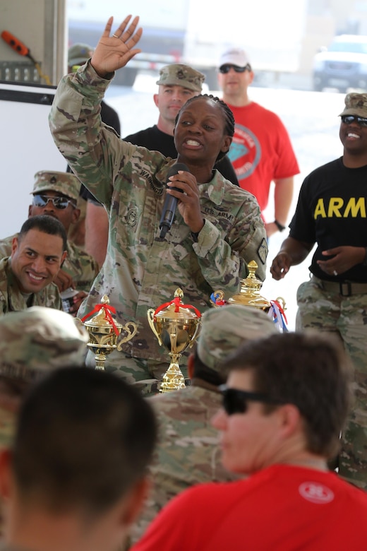 Command Sgt. Maj. Tara Washington, the senior enlisted advisor in the 160th Signal Brigade, celebrates the final awards for NCO Week at Camp Arifjan, Kuwait, Oct. 14, 2016. The week included classes, an induction ceremony and a physical fitness course to recognize the noncommissioned officers supporting U.S. Army Central. (U.S. Army photo by Sgt. Brandon Hubbard, USARCENT Public Affairs)
