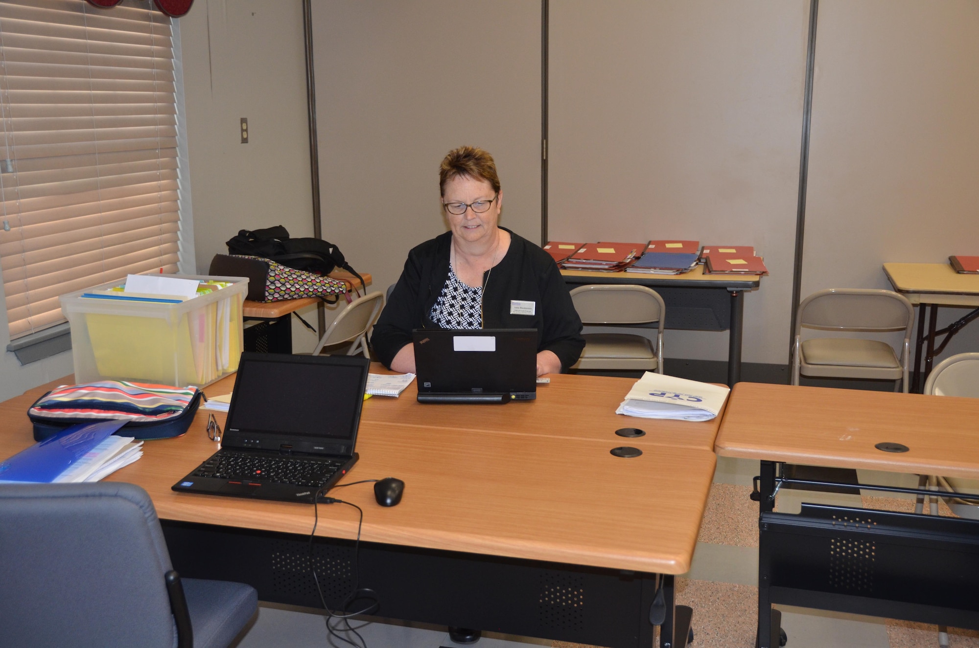 Anne Rasmussen, child development branch chief for AFSVA, inputs data during an inspection of JBSA-Fort Sam Houston’s Child Development Center. (U.S. Air Force Photo by Steve Warns)