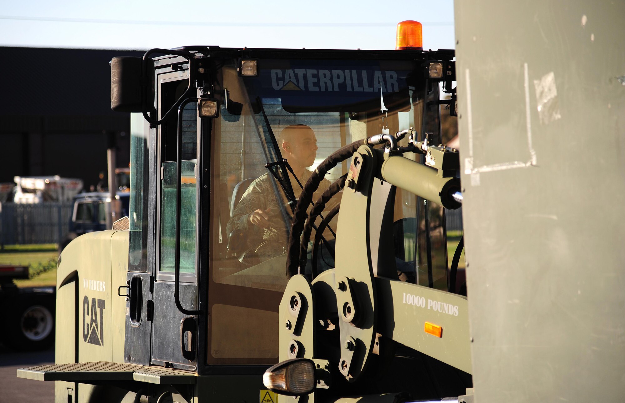 U.S. Air Force Airman Jonathan Snyder, a vehicle operator with the 509th Logistics Readiness Squadron, transfers a crate containing personal protective equipment onto a truck to be processed and weighed during exercise Global Thunder 17 (GT17) at Whiteman Air Force Base, Mo., Oct. 24, 2016. GT17 is U.S. Strategic Command’s annual field training and battle staff exercise to train Department of Defense forces and assess joint operational readiness. (U.S. Air Force photo by Senior Airman Joel Pfiester)