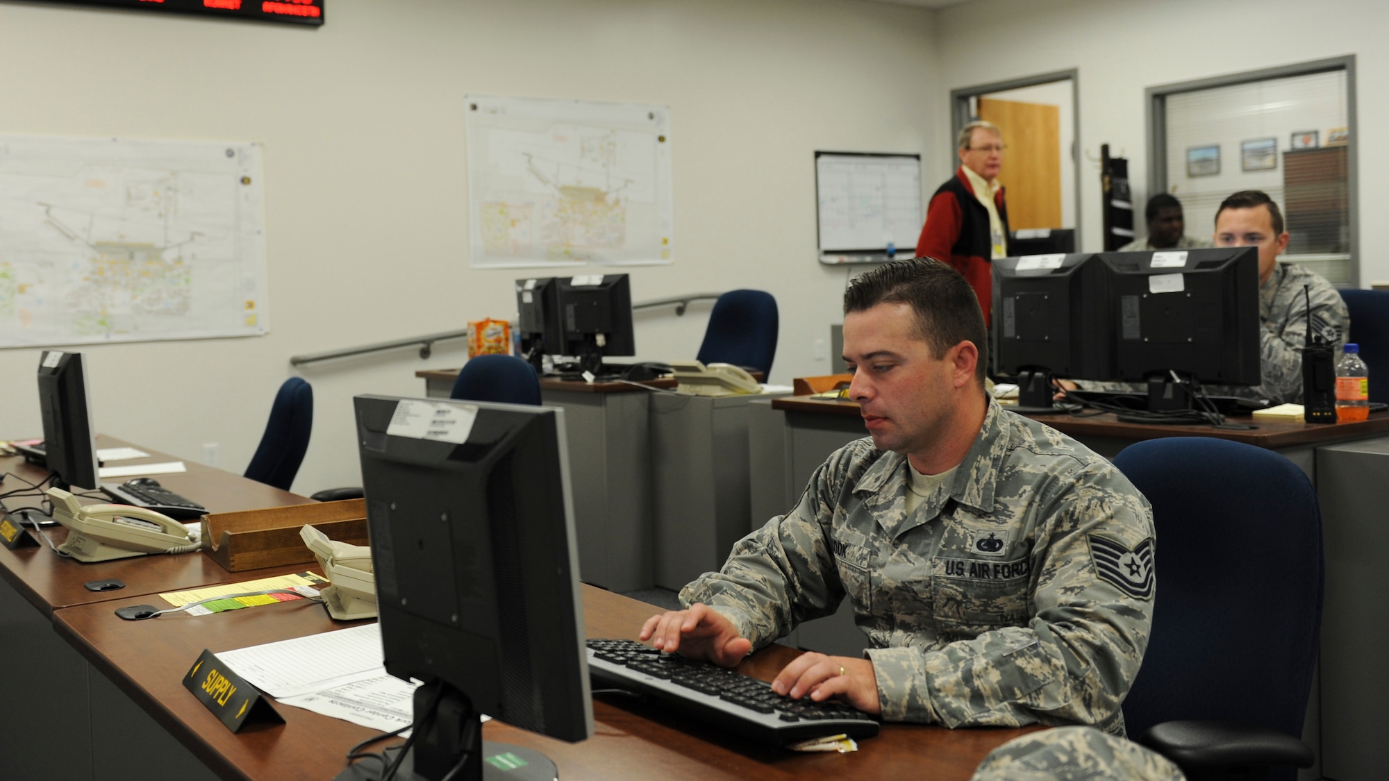 U.S. Air Force Tech. Sgt. Stephen Cook, the NCO in charge of equipment with the 509th Logistics Readiness Squadron (LRS), oversees the supply section of the deployment control center during Exercise Global Thunder 17 (GT17) at Whiteman Air Force Base, Mo., Oct. 25, 2016. The deployment control center is the centralized location tracking on the 509th LRS process during the exercise. Exercises like GT17 involve extensive planning and coordination to proide unique training opportunities for assigned units and forces. (U.S. Air Force Senior Airman Danielle Quilla)