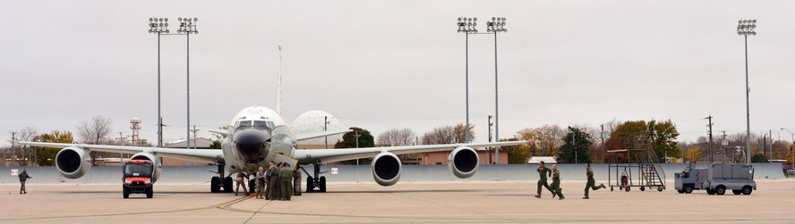 Team Offutt Airmen run to an RC-135 V/W Rivet Joint aircraft during Global Thunder 17, U.S. Strategic Command’s annual command post and field training exercise, Oct. 30, 2016, at Offutt Air Force Base, Neb. The exercise provided training opportunities for USSTRATCOM-tasked components, task forces, units and command posts to deter and, if necessary, defeat a military attack against the United States and to employ forces as directed by the President. (U.S. Air Force Photo by Drew Nystrom)