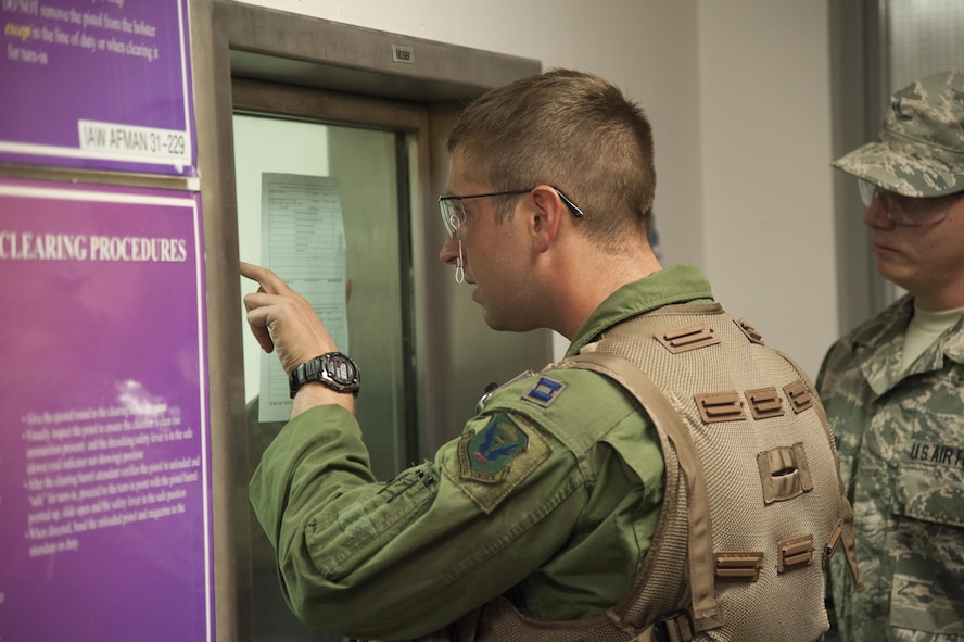 U.S. Air Force Capt. James Powers, a B-2 Spirit pilot with the 13th Bomb Squadron, reviews a hand receipt before receiving equipment at the 509th Operations Support Squadron aircrew flight equipment (AFE) shop during Exercise Global Thunder 17 at Whiteman Air Force Base, Mo., Oct. 25, 2016. Before stepping to their aircraft, pilots have to receive their life support equipment from the AFE shop. (U.S. Air Force photo by Senior Airman Joel Pfiester)