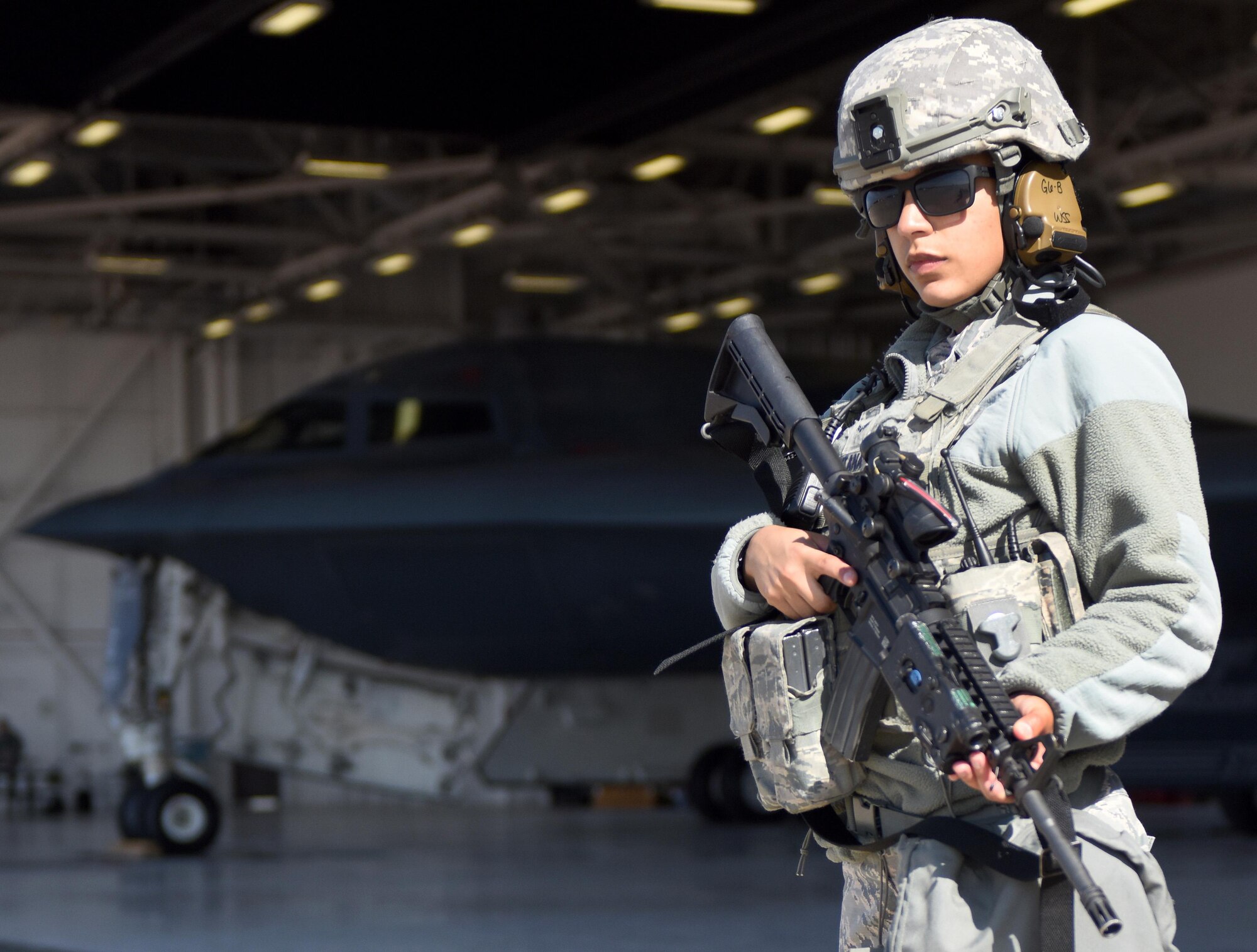 U.S. Air Force Airman 1st Class Carolina Santana, a security forces response member from the 509th Security Forces Squadron, provides security during Exercise Global Thunder 17 (GT17) at Whiteman Air Force Base, Mo., Oct. 27, 2016. GT17 provides training opportunities and exercise scenarios for all U.S. Strategic Command mission areas, with a specific focus on strategic readiness. (U.S. Air Force photo by Senior Airman Joel Pfiester) 