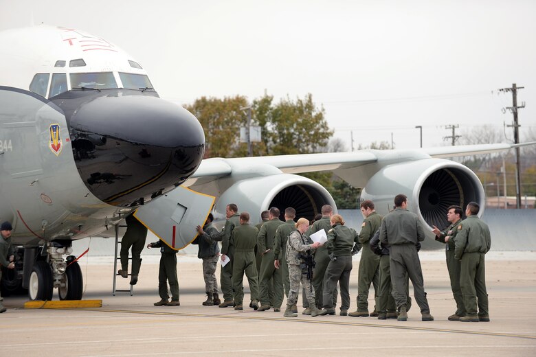 Team Offutt Airmen board an RC-135 V/W Rivet Joint aircraft during Global Thunder 17, U.S. Strategic Command’s annual command post and field training exercise, Oct. 30, 2016, at Offutt Air Force Base, Neb. The exercise provided training opportunities for USSTRATCOM-tasked components, task forces, units and command posts to deter and, if necessary, defeat a military attack against the United States and to employ forces as directed by the President. (U.S. Air Force Photo by Delanie Stafford)