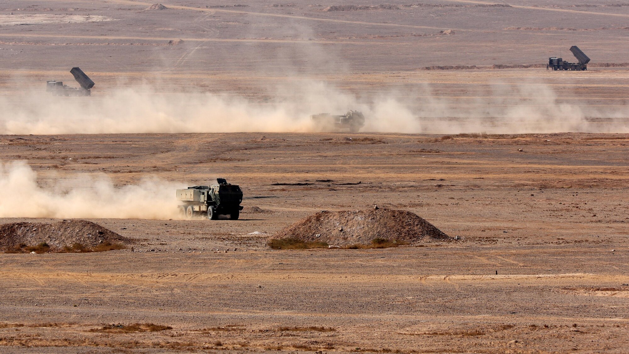 Soldiers from the Jordanian Army’s 29th Royal HIMARS Battalion and the U.S. Army’s 3rd Battalion, 321st Field Artillery Regiment conduct a quick turn-around during a live-fire exercise October 25. The two nations continue to partner to ensure interoperability.