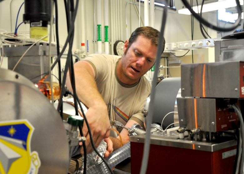 Air Force Research Laboratory scientist Oscar Martinez works on a turbomolecular pump in the Space Vehicles Directorate’s Plasma Lab. Martinez recently took part in a unique 10-day event called AFRL 2016 TECH Warrior. The purpose of the course is to give AFRL scientists and engineers an immersive experience in a full operational field exercise.