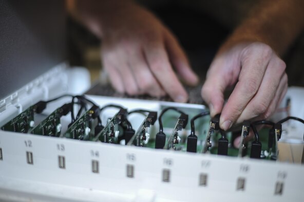 Staff Sgt. Philip French, 355th Maintenance Group Air Force repair enhancement program technician, repairs an iPad charging station at Davis-Monthan Air Force Base, Ariz., Oct. 25, 2016. AFREP’s main priority is to optimize resources by increasing the wing-level repair capability of aerospace parts and equipment and enable the repair of certain items if the repair of the item is cost effective without risk to mission performance. (U.S. Air Force photo by Airman 1st Class Mya M. Crosby)