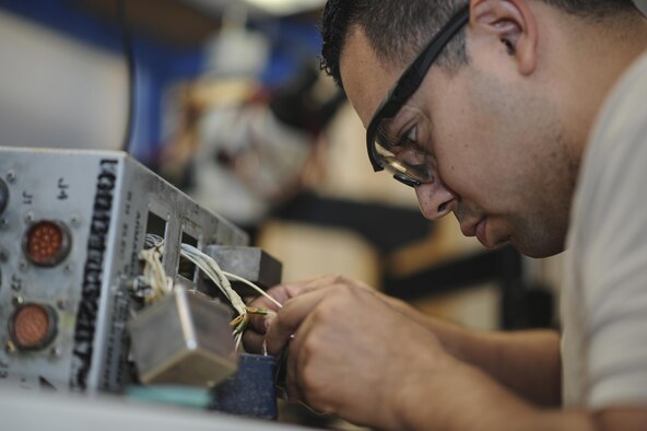Staff Sgt. Vincent Cruz, 355th Maintenance Group Air Force repair enhancement technician, solders a replacement relay for an armament relay box that controls some of the A-10 weapons systems at Davis-Monthan Air Force Base, Ariz., Oct. 25, 2016. D-M’s AFREP possesses a repair rate of 95 percent and a financial benefit of over two million dollars. (U.S. Air Force photo by Airman 1st Class Mya M. Crosby)