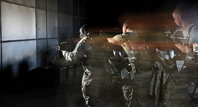 Airmen assigned to the 799th Security Forces Squadron practice procedures in clearing a room, Oct. 21, 2016, at Range 63C, Silver Flag Alpha, Nev. The training focused on a team’s ability to simultaneously move and communicate through hand gestures and tactical verbiage while entering, securing and exiting a room. (U.S. Air Force photo by Airman 1st Class James Thompson) 