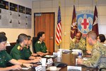 Regional Health Command-Pacific (RHC-P) leadership host a Vietnamese delegation in an effort to strengthen military medical and health partnerships in the Indo-Asia-Pacific region. Members of the Vietnamese delegation attend a briefing with RHC-P leadership to learn about RHC-P's priorities - being medically ready and leading regional health partnerships.