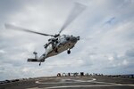 An MH-60S Sea Hawk helicopter assigned to the “Golden Falcons” of Helicopter Sea Combat Squadron (HSC) 12 takes off from the flight deck of the forward-deployed Arleigh Burke-class guided-missile destroyer USS Barry (DDG 52) after refueling during Keen Sword 17 (KS17), Nov. 1, 2016. KS17 is a biennial, Chairman of the Joint Chiefs of Staff-directed, U.S. Pacific Command-sponsored Field Training Exercise (FTX). KS17 is a joint/bilateral FTX designed to meet mutual defense objectives by increasing combat readiness and interoperability between Japan Self-Defense Forces (JSDF) and U.S. Forces. Barry is on patrol with Carrier Strike Group Five (CSG 5) in the Philippine Sea supporting security and stability in the Indo-Asia-Pacific region. 