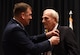 Maj. Gen. Christopher Bence, the U.S. Air Force Expeditionary Center commander, pins the Silver Star on former Maj. William “Joe” Schneider during a ceremony on Joint Base McGuire-Dix-Lakehurst, N.J., Nov. 1, 2016, for his actions while commanding an 18-plane bombing raid on Feb. 23, 1945 over Italy. (U.S. Air Force photo/Tech. Sgt. Jamie Powell)