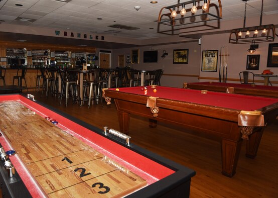 The wrangler room, an activity area, sits in the Trail’s End at F.E. Warren Air Force Base, Wyo., Nov. 2, 2016. The room has a bar, pool tables and a popcorn machine for Airmen and families to enjoy. (U.S. Air Force photo by Airman 1st Class Breanna Carter)