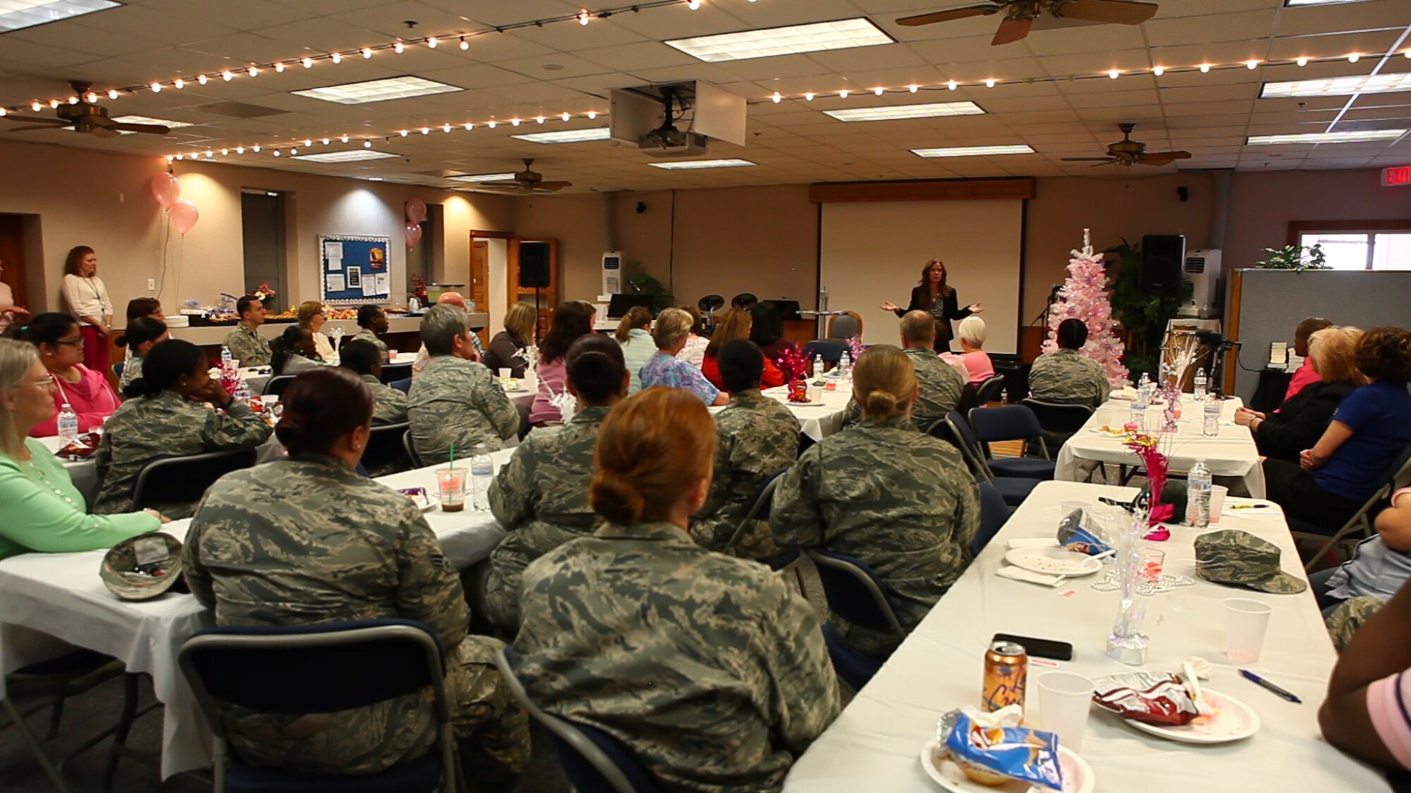 Lauren Miller, a breast cancer survivor and acclaimed author on handling stress, speaks about her experience to an audience at F.E. Warren Air Force Base, Wyo., Oct. 27, 2016. The 90th Medical Group hosted Miller as a guest speaker as one of the events commemorating Breast Cancer Awareness Month. Every year in October, military bases host a multitude of events to bring the issue of breast cancer to the forefront. Addressing the audience, Miller said, "The first step toward recovery is ruthless valiant honesty.” (U.S. Air Force Photo by Lan Kim)