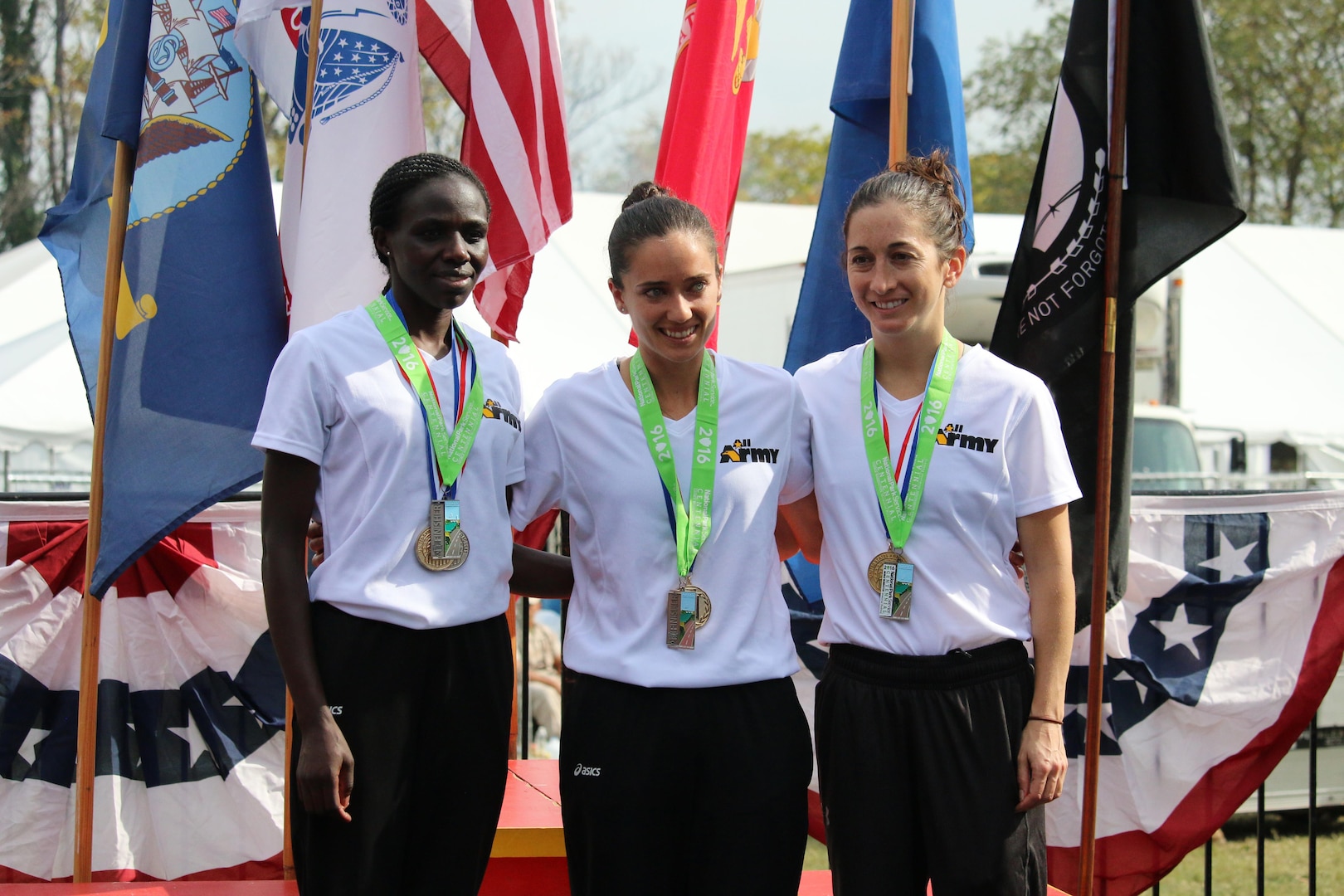 Army captures Armed Forces Women's Marathon Gold. The 2016 Armed Forces Marathon is held in conjunction with the 41st Marine Corps Marathon on 30 October in Washington, D.C. From left to right: Pfc. Susan Tanui, Fort Riley, Kan. - 3:06:26; Capt. Meghan Curran, Denver, Colo. - 2:53:19; Capt. Nicole Solana, JB Lewis-McChord, Wash. - 3:13:58