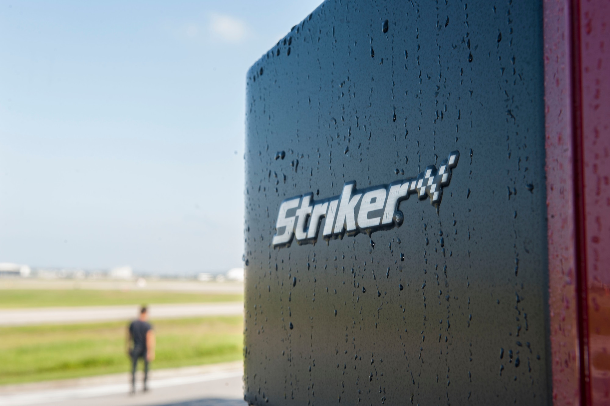 An 18th Civil Engineer Squadron Oshkosh Striker 6x6 sits at the ready on the flightline Oct. 31, 2016, at Kadena Air Base, Japan. Strikers are utilized by fire departments across the Air Force for extinguishing aircraft fires. (U.S. Air Force photo by Senior Airman Lynette M. Rolen)