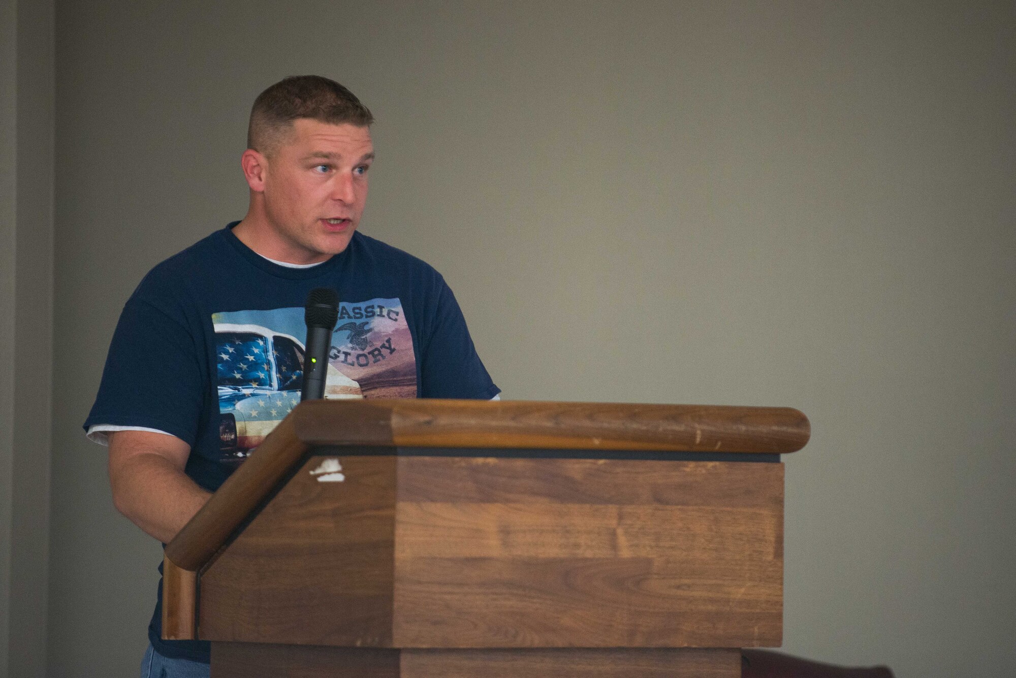 U.S. Air Force Master Sgt. Gordon Carpenter, 5th Reconnaissance Squadron section chief, speaks during an Osan Storytellers event at the Mustang Club at Osan Air Base, Republic of Korea, Oct. 26, 2016. Carpenter shared his account of resiliency as a single father and First Term Airman. Osan Storytellers is a quarterly event giving Airmen of all ranks the opportunity to share personal and military experience with other Airmen. (U.S. Air Force photo by Senior Airman Dillian Bamman)