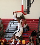 Army Spc. Mamadou Seck of Fort Stewart, Georgia hits the dunk as he led Army scoring with 21 points as Army beat Marine Corps 107-63.  The 2016 Armed Forces Men's Basketball Championship held at MCB Quantico, Va. from 1-7 November.  The best two teams during the doubel round robin will face each other for the 2016 Armed Forces crown.  