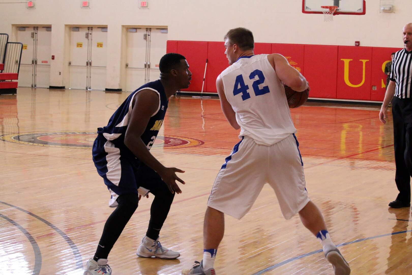 Air Force 1st Lt William Kammerer of Eglin AFB, Florida gets ready to drive the lane as Air Force defeats Navy 79-72.  The 2016 Armed Forces Men's Basketball Championship held at MCB Quantico, Va. from 1-7 November.  The best two teams during the doubel round robin will face each other for the 2016 Armed Forces crown.  