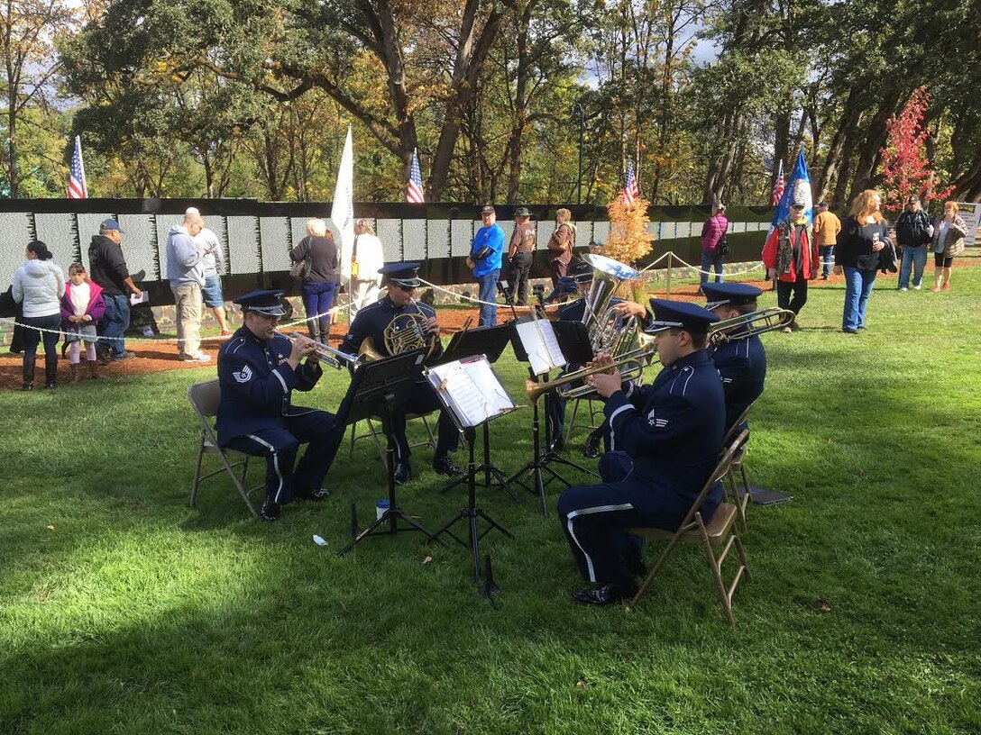 Travis brass performs in Eugene, Oregon at the moving Vietnam wall.  They were there as part of their fall 2016 tour. (Photo- Emerald Empire Military Officer's Association)