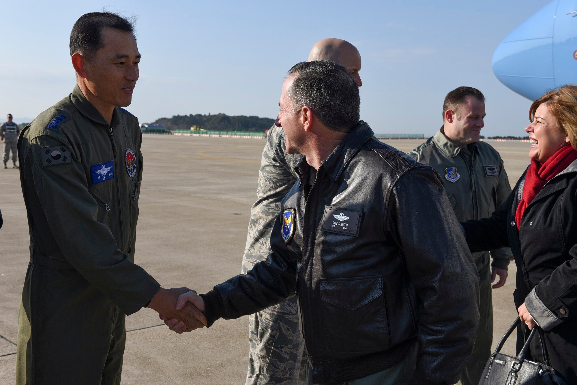 Col. Sung-Bok Lee, 38th Fighter Group commander, greets Air Force Chief of Staff, Gen. David L. Goldfein, at Kunsan Air Base, Republic of Korea, Nov. 2, 2016. Goldfein traveled to Kunsan to meet with airmen and discuss his focus areas as Air Force Chief of Staff as well as the Air Force mission throughout the Pacific region.  (U.S. Air Force photo by Senior Airman Michael Hunsaker/Released)