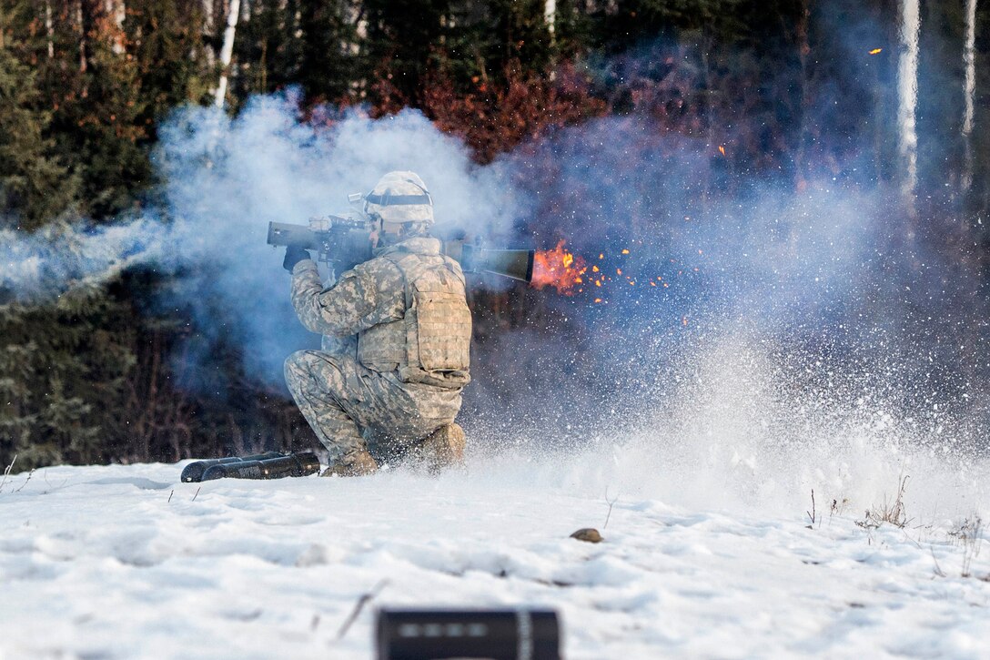 Army Spcs. Dino Torres, foreground, and Anthony Alfaro fire the Carl Gustaf recoilless rifle during live-fire training at Joint Base Elmendorf-Richardson, Alaska, Nov. 1, 2016. Torres and Alfaro are assigned to the 25th Infantry Division’s Company B, 3rd Battalion, 509th Parachute Infantry Regiment, 4th Infantry Brigade Combat Team (Airborne), Alaska. Air Force photo by Alejandro Pena