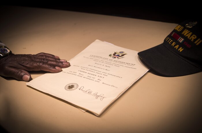 Francis Bolds, United States Navy Retired Senior Chief Petty Officer from James Island, South Carolina, presents his Navy retirement certificate at the Veteran Affairs building Oct. 24, 2016. Bolds is a World War II, Korean and Vietnam War veteran who has volunteered at the VA for over 20 years. Bolds will be the grand marshal at the Veterans Day Parade in downtown Charleston Nov. 6.