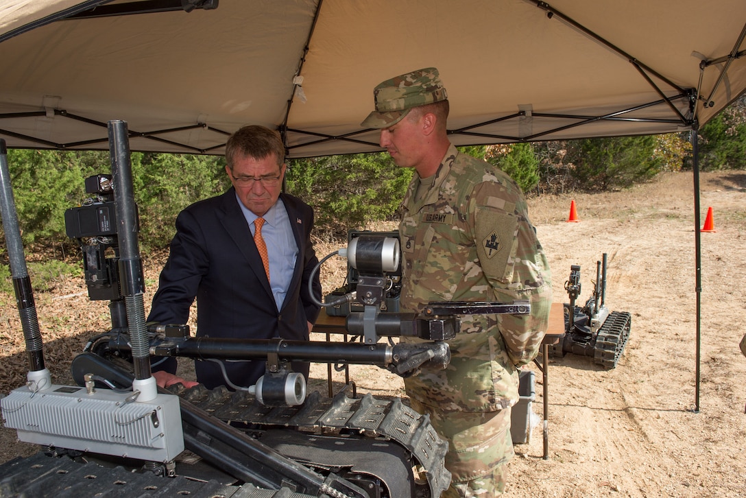 Defense Secretary Ash Carter receives a briefing on route clearance and robot operations during an exercise at Fort Leonard Wood, Mo., Nov. 2, 2016. DoD photo by Army Sgt. Amber I. Smith