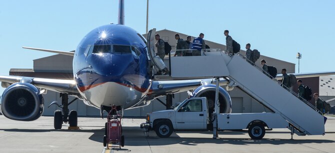 Airmen board a passenger aircraft at Barksdale Air Force Base, La., Oct. 22, 2016, in support of U.S. Strategic Command exercise Global Thunder 17. USSTRATCOM forces are on watch 24-hours-a-day, 7-days-a-week, conducting operations to deter and detect strategic attack against the U.S. and its allies. (U.S. Air Force photo/Senior Airman Curt Beach)