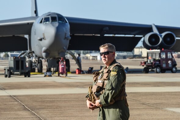 A B-52 Stratofortress pilot performs a post-flight inspection of an aircraft at Barksdale Air Force Base, La., Oct. 30, 2016, after supporting U.S. Strategic Command exercise Global Thunder 17.  GT17 is an annual U.S. Strategic Command-sponsored command post and field training exercise designed to provide training opportunities and to test and validate command, control and operational procedures. (U.S. Air Force photo/Senior Airman Luke Hill)