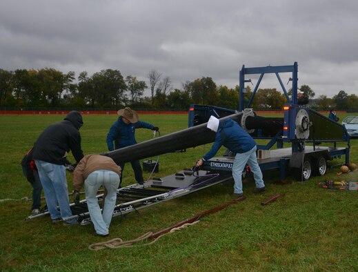 Team ETHOS assembles their pumpkin chucking machine prior to a competition here, Oct. 21. The team is comprised of researchers, engineers and students from the Air Force Research Laboratory and competes annually in contests across the U.S. The team earned a first-place finish at the Air Force Lifecycle Management Center’s 2016 annual competition with a 3,391 foot pumpkin toss and will compete in the World Championship ‘Punkin Chunkin’ competition in Bridgeville, Delaware, Nov. 4-6. (U.S. Air Force Photo / David Dixon)