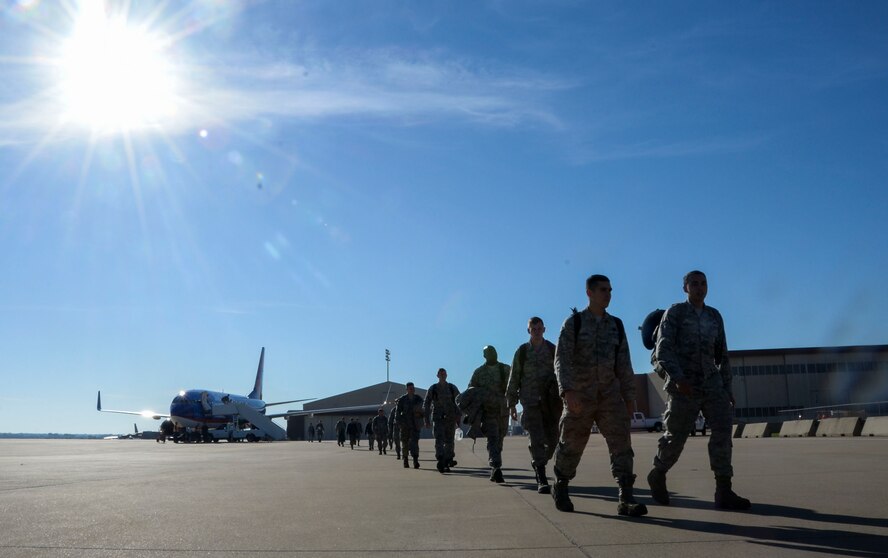 Airmen disembark a passenger aircraft at Barksdale Air Force Base, La., Oct. 31, 2016, after supporting U.S. Strategic Command exercise Global Thunder 17. USSTRATCOM’s fundamental mission is to deter strategic attack, which is an existential threat to the U.S. and its allies. Testing readiness ensures the preservation a safe, secure, effective and ready strategic deterrent force. (U.S. Air Force photo/Senior Airman Amanda Morris)