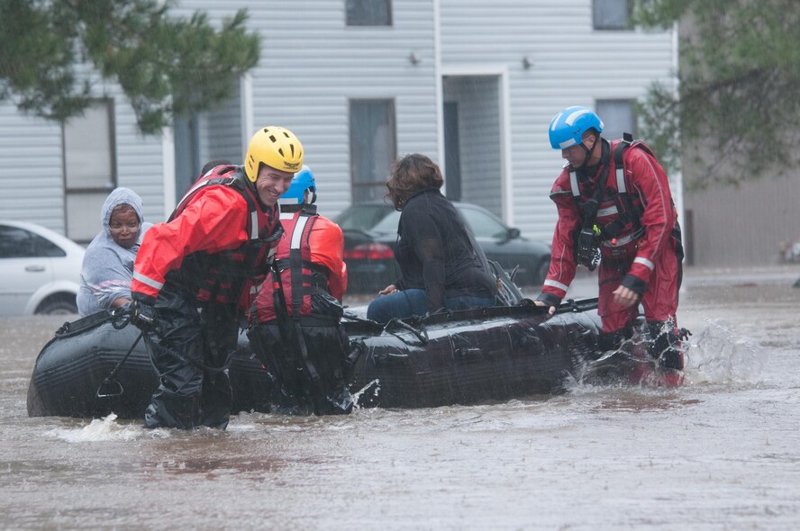 North Carolina emergency services evacuate residents of a neighborhood that fell victim to the flooding caused by Hurricane Matthew in Fayetteville, N.C., Oct 08, 2016. Heavy rains caused by Hurricane Matthew have led to flooding as high as five feet in some areas. (U.S. Army National Guard photo by Staff Sgt. Jonathan Shaw, 382nd Public Affairs Detachment/Released)