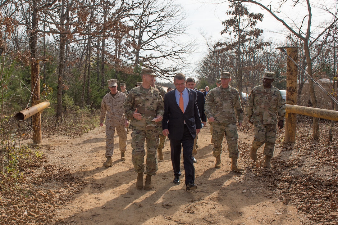 Defense Secretary Ash Carter walks with Army Maj. Gen. Kent D. Savre before a demonstration of the construction of demolition charges at Fort Leonard Wood, Mo., Nov. 2, 2016. DoD photo by Army Sgt. Amber I. Smith