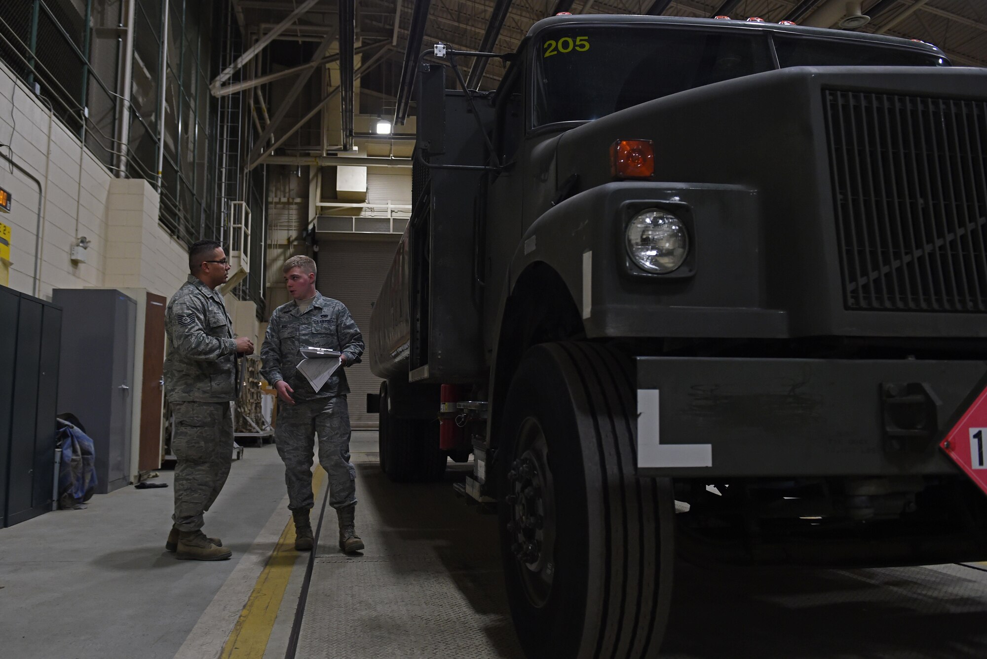 Airmen perform a fuel truck inspection during exercise Polar Force 17-1 at the Joint Mobility Center, Nov. 2, 2016. Polar Force exercise scenarios included in-processing newly arrived overseas personnel from a Noncombatant Evacuation Operation, deploying Airmen, and preparing strategic mission postures from deployed locations. 