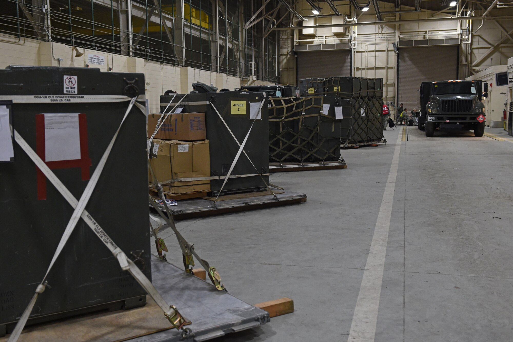 Cargo pallets and fuel trucks sit in the Joint Mobility Center during exercise Polar Force 17-1 at Joint Base Elmendorf-Richardson, Nov. 2, 2016. The exercise tests the wing in conducting deployments, receptions, noncombatant evacuations and employment operations. 