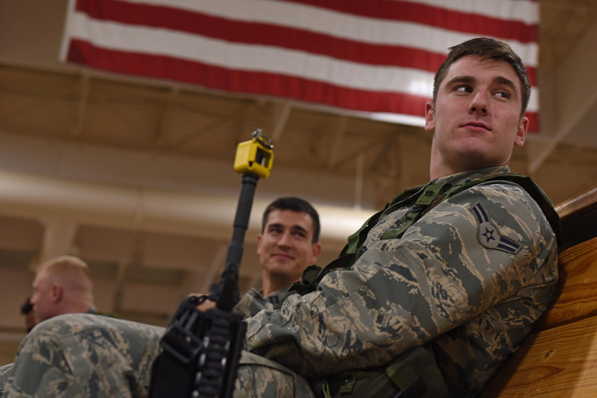 Airman 1st Class Nicolas Evans with the 773d Civil Engineer Squadron, waits to take part in a simulated Personnel Deployment Function line before a mock-deployment as part of exercise Polar Force 17-1 at the Joint Mobility Center, Nov. 2, 2016. During the simulated exercise, Airmen moved through a process line to ensure their ability to deploy and were briefed by multiple agencies with vital information for their deployment. 