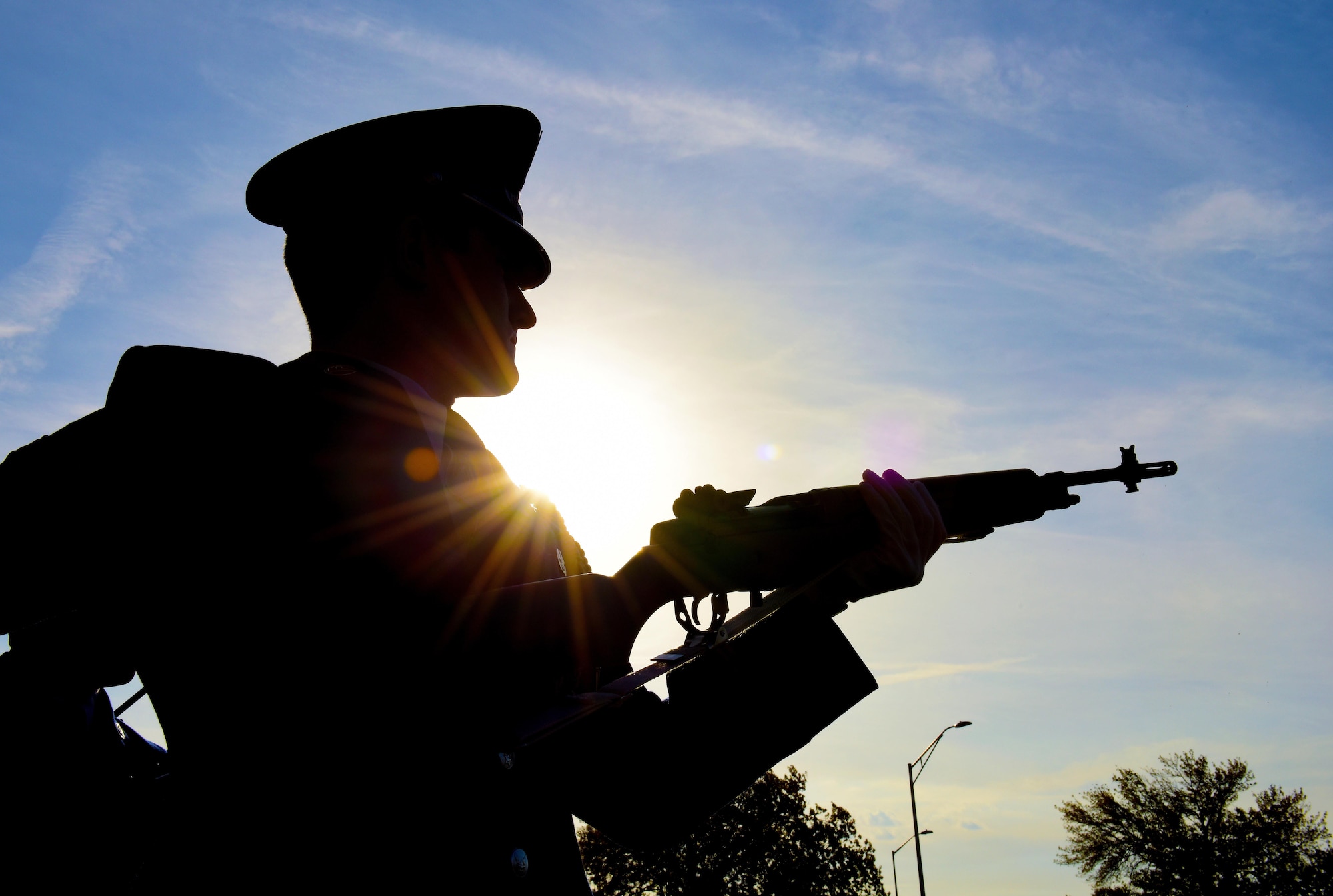 U.S. Air Force Airman 1st Class Christopher Schacher, a full-time member of the Whiteman Air Force Base Honor Guard fires his rifle during a simulated firing party at Whiteman Air Force Base, Mo., Nov. 2, 2016. Air Force retiree funerals are provided with a flag folding ceremony and presentation, a firing team and the playing of taps. (U.S. Air Force photo by Senior Airman Joel Pfiester)