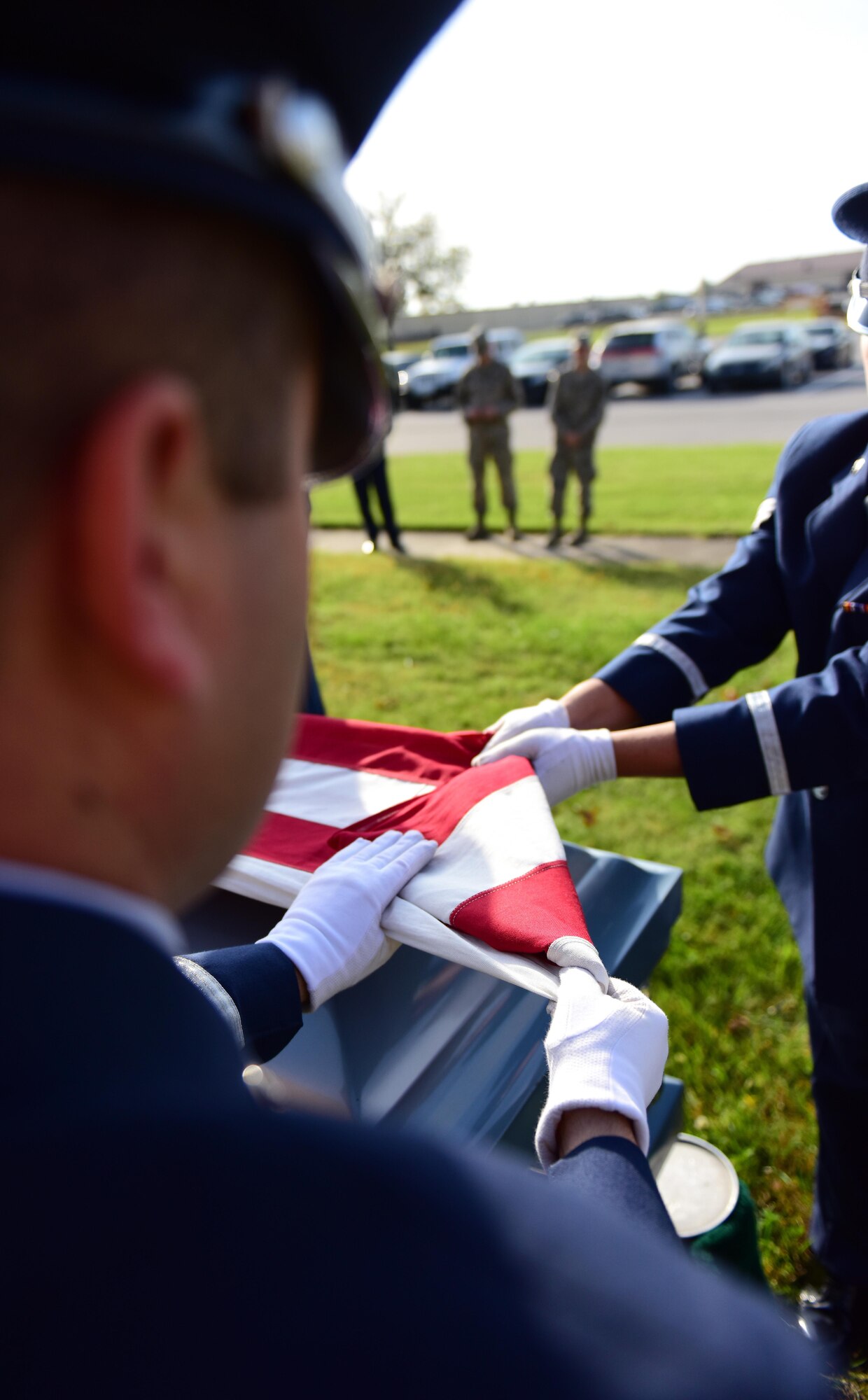 Members of the Whiteman Air Force Base Honor Guard fold a flag during a simulated funeral at Whiteman Air Force Base, Mo., Nov. 2, 2016. The Whiteman Honor Guard performs a wide array of ceremonies from color guard details to saber teams for weddings, however, the primary mission of the Whiteman Honor Guard is to provide funeral honors for veterans, retirees and active-duty members. (U.S. Air Force photo by Senior Airman Joel Pfiester)