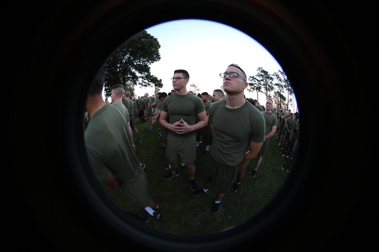 Cpl. Jaryd Frankenfield, left, and Cpl. Federico GarciaCruz join other members of their squadron prior to a Marine Corps birthday run at Marine Corps Air Station Cherry Point, N.C., Nov. 3, 2016. The run celebrated the 241st Marine Corps birthday and strengthened pride, esprit de corps, and camaraderie among all Marines and Sailors aboard the air station. Frankenfield and GarciaCruz are both administrative specialist with Headquarters and Headquarters Squadron.  (U.S. Marine Corps photo by Sgt. N.W. Huertas/Released)