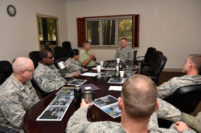 Chaplain (Lt. Col.) Walter Bean, 628th Air Base Wing Chaplain Corps senior chaplain, briefs Chaplain (Col.) James Tims, Air Mobility Command chaplain, about the Joint Base Charleston chapel and its mission here, Nov. 3, 2016. Chaplain Tims met with chapel staff and participated in a promotion ceremony while visiting JB Charleston Nov. 2 through Nov. 6.