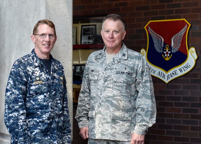 U.S. Navy Capt. Robert Hudson, left, Joint Base Charleston deputy commander, meets with U.S. Air Force Chaplain (Col.) James Tims, right, Air Mobility Command chaplain, here, Nov. 3, 2016. Chaplain Tims met with chapel staff and participated in a promotion ceremony while visiting JB Charleston Nov. 2 through Nov. 6.