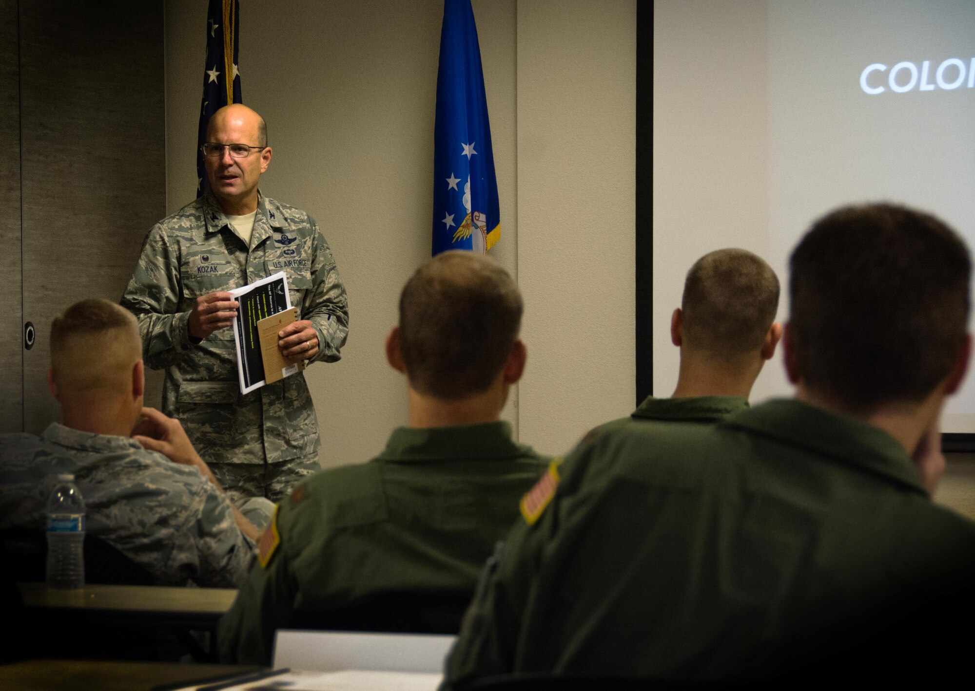 Col. Raymond Kozak, 349th Air Mobility Wing commander, addresses officers during an Officer Developement Course at Travis Air Force Base, Calif., on Nov. 3, 2016. The ODC provided officers the opportunity to obtain valuable tools and skills in leadership principles and practices. (U.S. Air Force photo/Staff Sgt. Daniel Phelps)