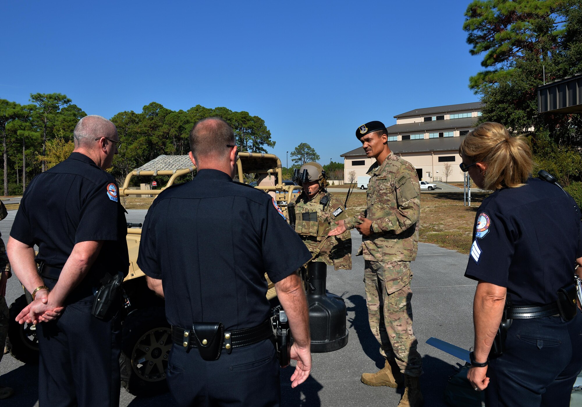 Staff Sgt. Marco Nelson, team leader of the Deployed Aircraft Ground Response Element, gives a demonstration about their gear during a tour at Hurlburt Field, Fla., Nov. 1, 2016. This unit provides security for Air Force Special Operations Command and Special Operations Forces airfields where security is unknown or inadequate. (U.S. Air Force photo by Senior Airman Andrea Posey)