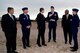 At center, Deputy Assistant Secretary of the Air Force for Environment, Safety and Infrastructure Mark Correll is briefed by Peterson Air Force Base leadership at the fire department’s training facility Nov. 2, 2016. Correll and his team were visiting Peterson to discuss perfluorinated compounds contamination issue in the Fountain, Security and Widefield communities’ water supply aquifer.  (U.S. Air Force photo/Rob Bussard)