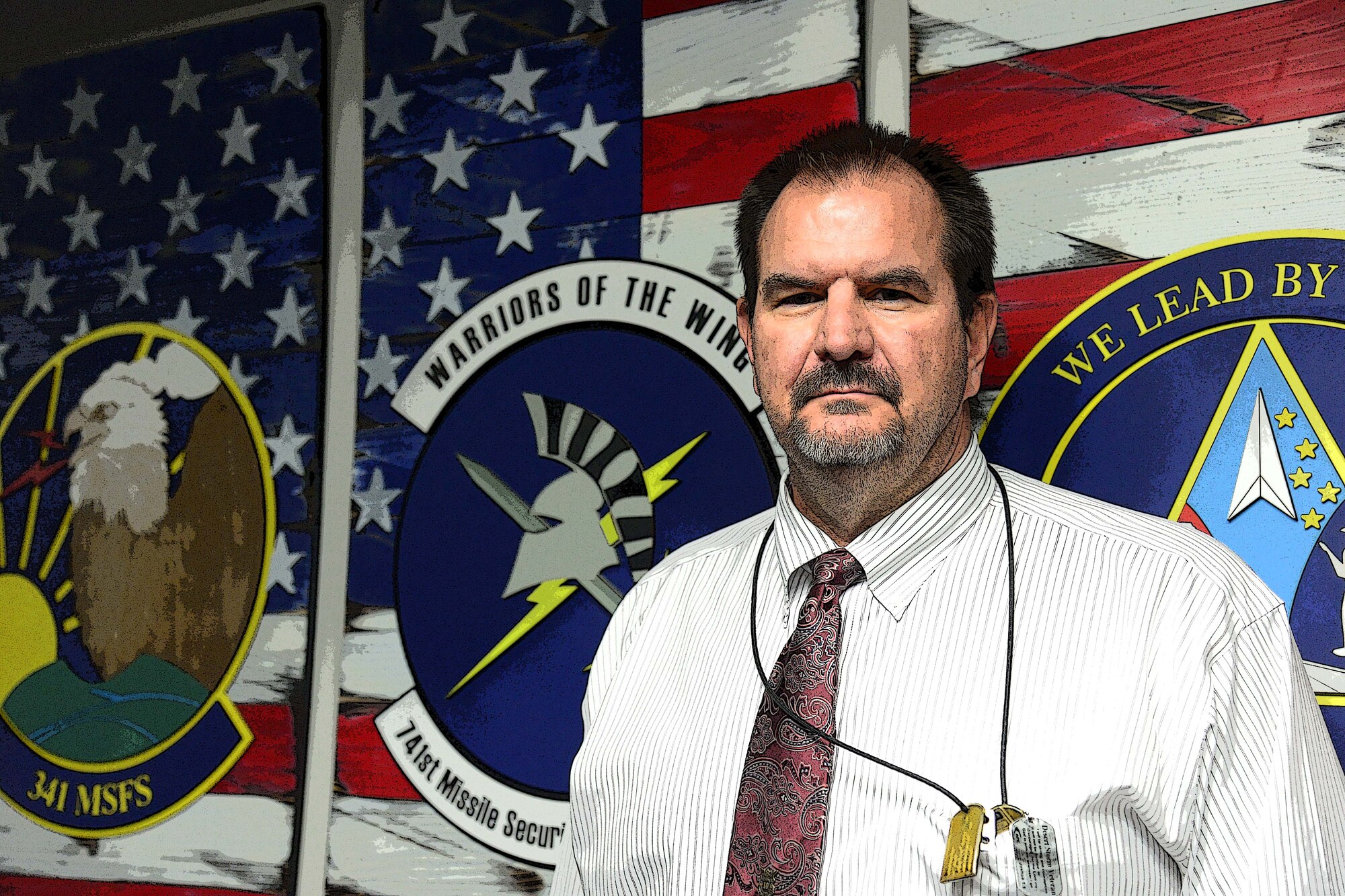 Stan Moody, 341st Security Forces Group plans and projects manager, poses for a photo Nov. 2, 2016, at Malmstrom Air Force Base, Mont. Moody has been the plans and projects manager at Malmstrom for the past five years, is passionate about his job and recently received the Civilian Category II Supervisory Award for the third quarter at the wing level. (U.S. Air Force photo/Airman 1st Class Magen M. Reeves)