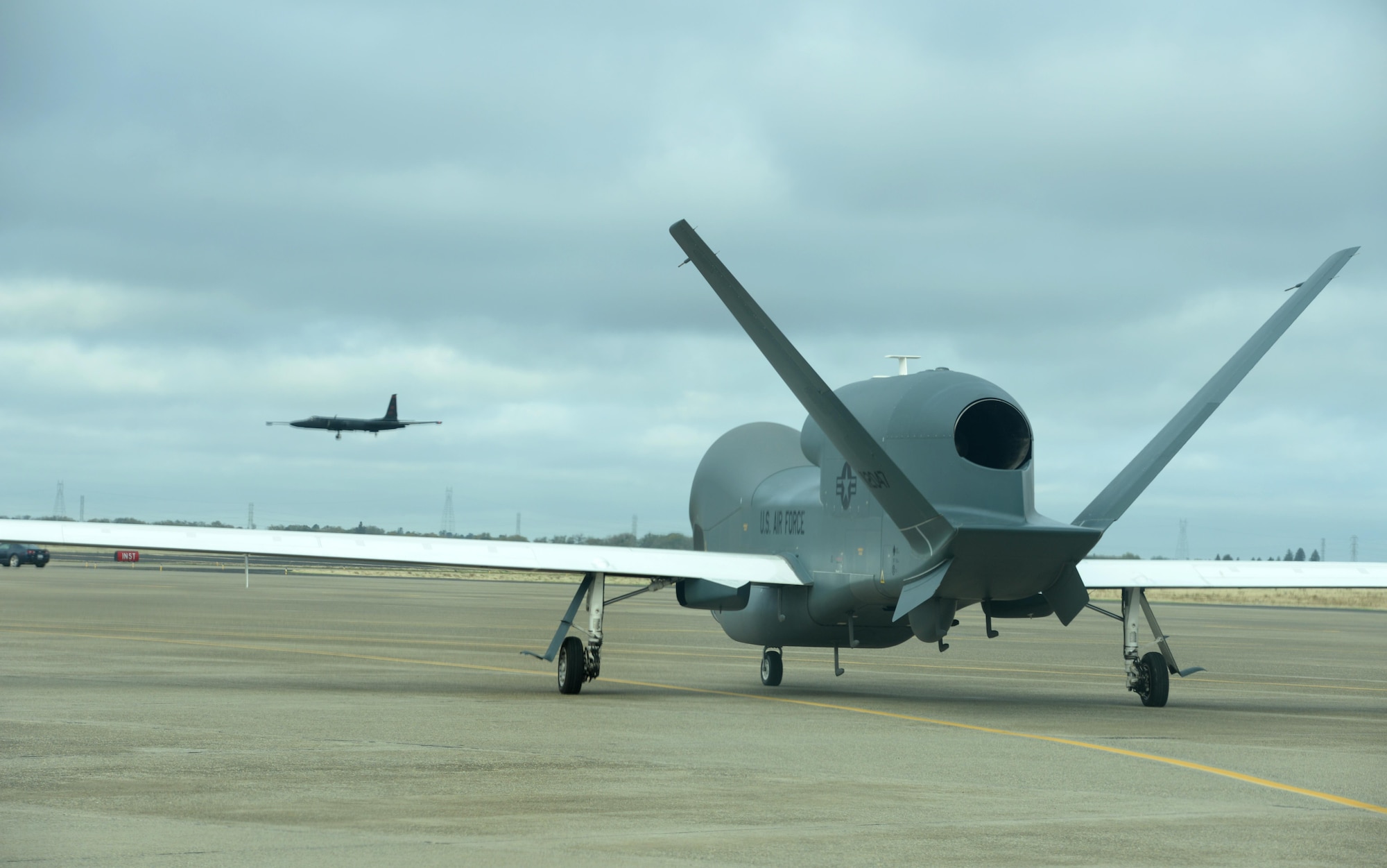 A RQ-4 Global Hawk proceeds down the taxiway prior to departure Nov. 1, 2016, at Beale Air Force Base, California. The RQ-4 Global Hawk is a high-altitude, intelligence, surveillance and reconnaissance, long-endurance, remotely piloted aircraft. (U.S. Air Force photo/Staff Sgt. Bobby Cummings)